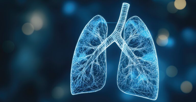Digital illustration of human lungs with a network of glowing blue lines against a dark background.