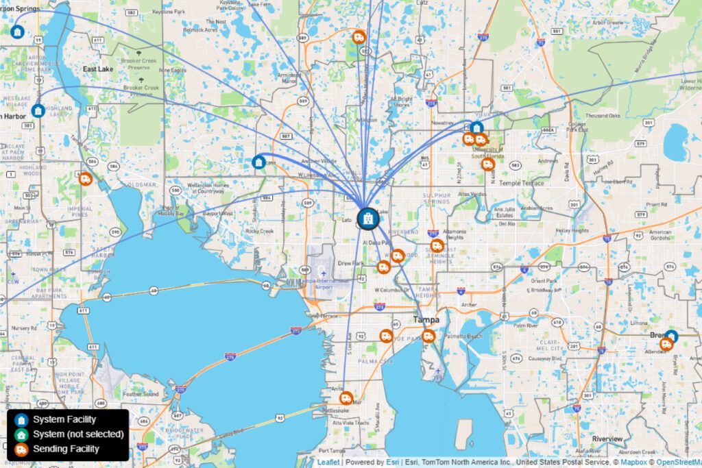 A map of the Tampa, Florida area showing locations of system facilities, sending facilities, and system (not selected) sites, with connecting lines to a central facility.
