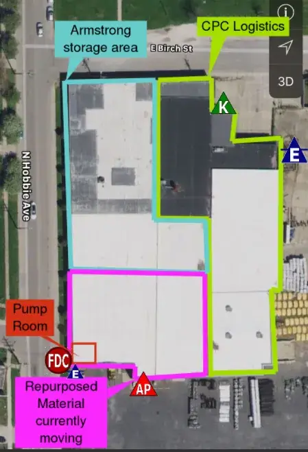 Aerial view of a building with labeled zones: Armstrong storage area, CPC Logistics, Pump Room, Repurposed Material. Streets and entry points are marked.